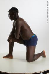 Underwear Man Black Kneeling poses - ALL Muscular Medium Kneeling poses - on one knee Black Standard Photoshoot Academic